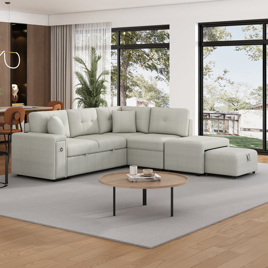 Gray chenille 4-seater convertible sofa bed with movable ottoman and drop-down table with cup holders.