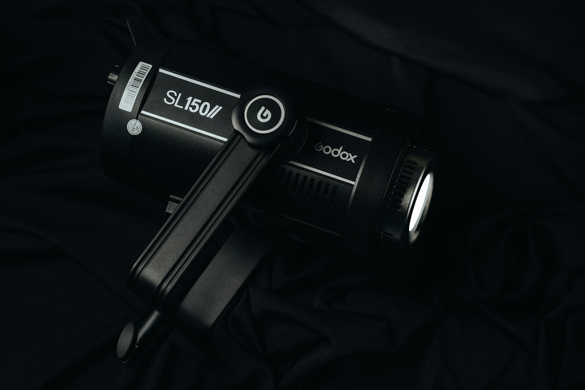 a close up of a camera on a black background