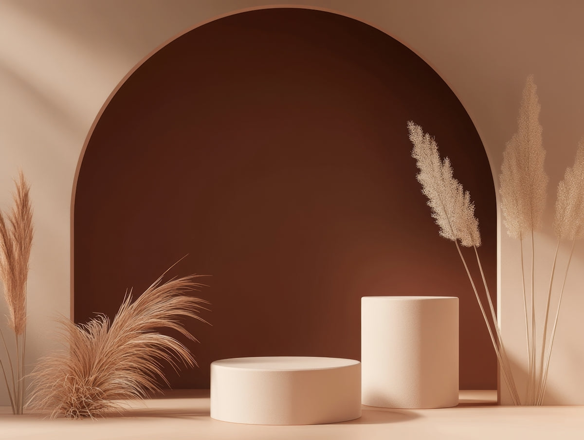 A white vase sitting on top of a table next to a plant