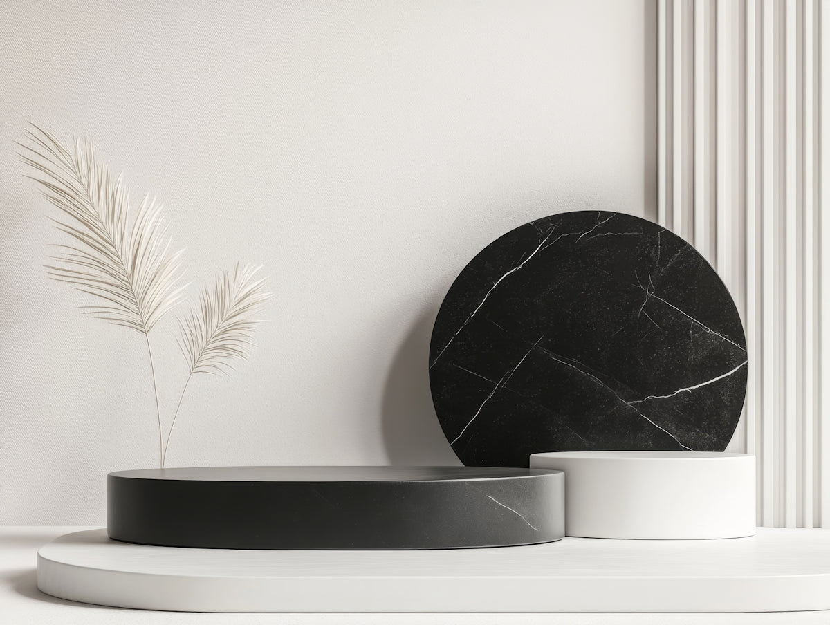 A black and white vase sitting on top of a table