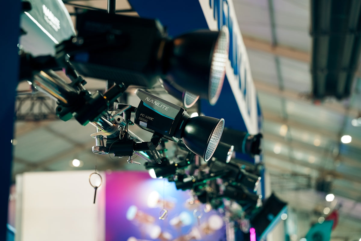 Row of professional stage lights at an event.
