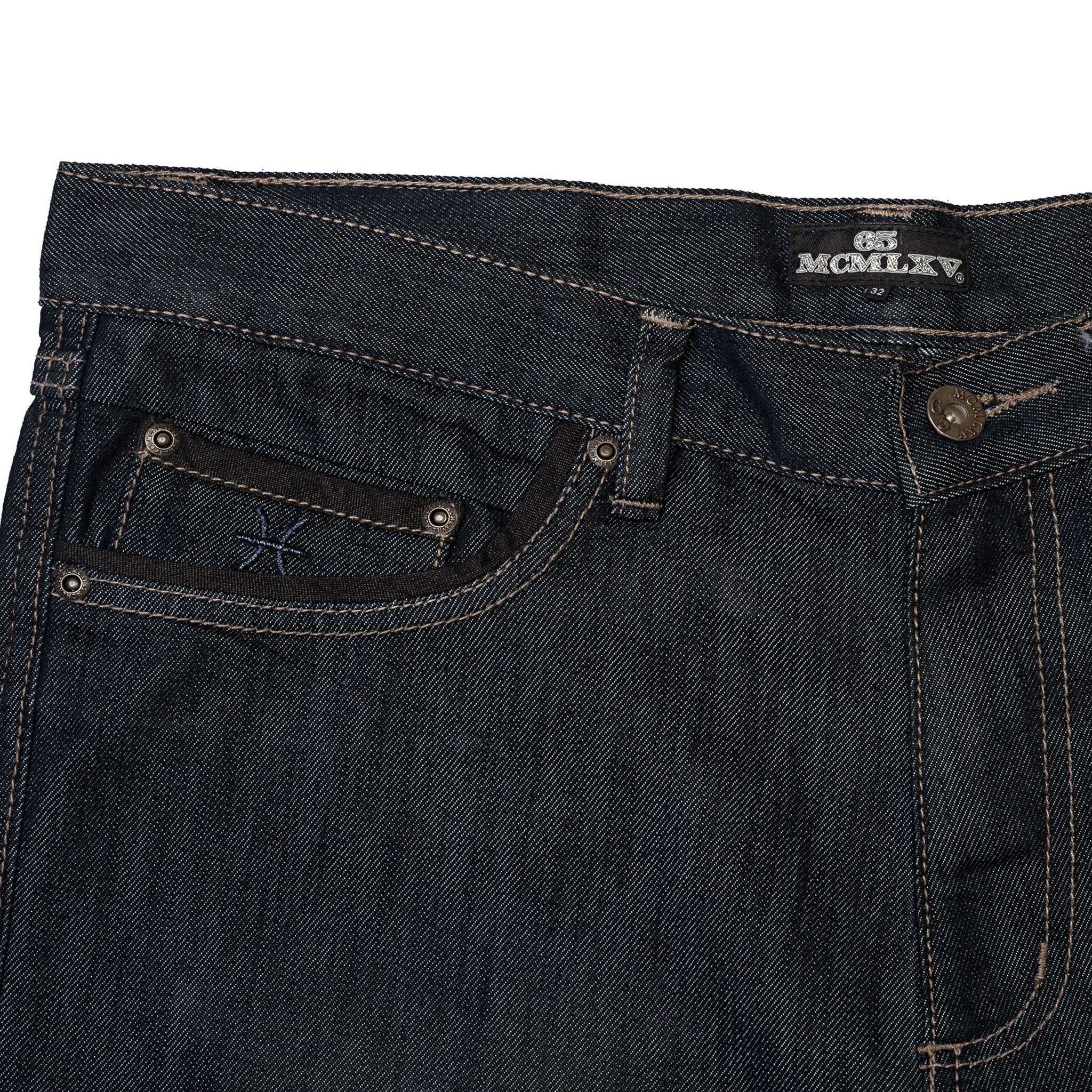 Close-up of 65 MCMLXV front pocket with logo metallic thread embroideries.
