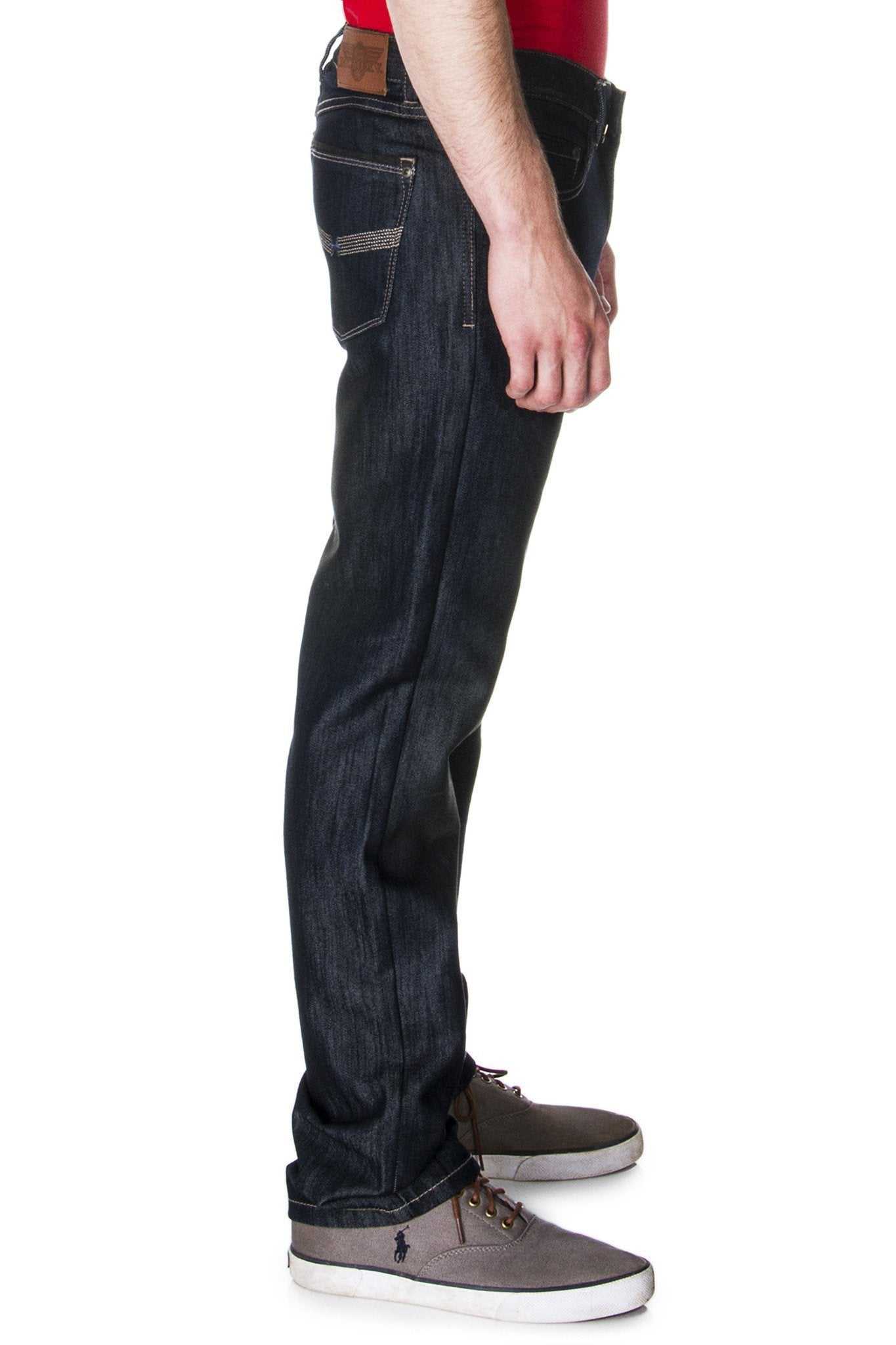 Side profile of the 65 MCMLXV premium dark denim, showing the classic straight-leg silhouette.