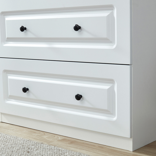 Detail Closeup of 2 Drawers with Black Knob Handles.