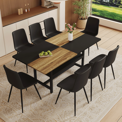 Dining table set with black chairs in a modern kitchen.