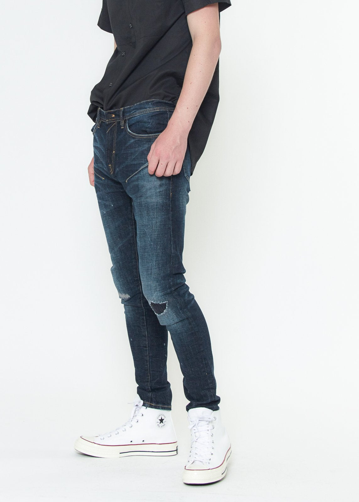 Konus Men's skinny jeans, Sky Blue denim, flat lay view showing front and rip and repair patchwork.