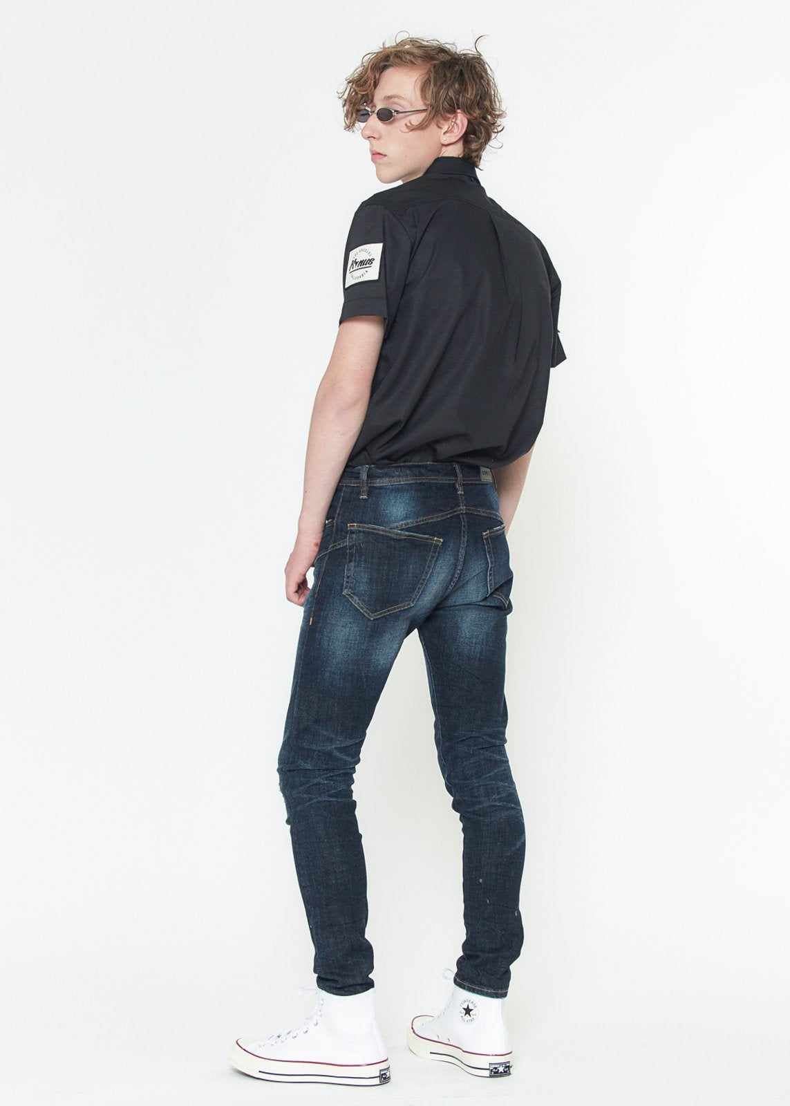 Back view of Konus Sky Blue skinny jeans, showing back pocket placement and fit.