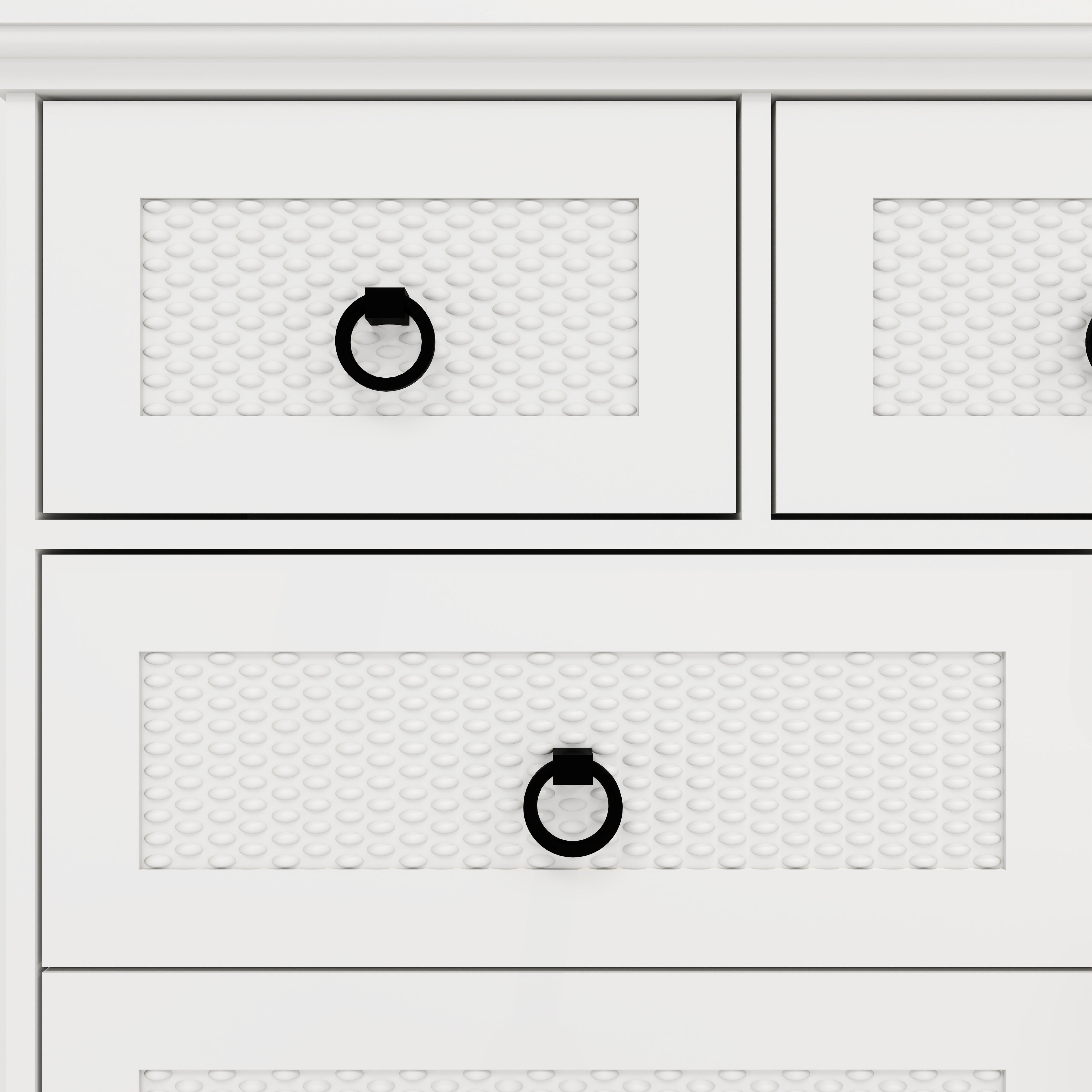 Close-up of Textured Panel Drawers on Modern White Dresser Front Left.
