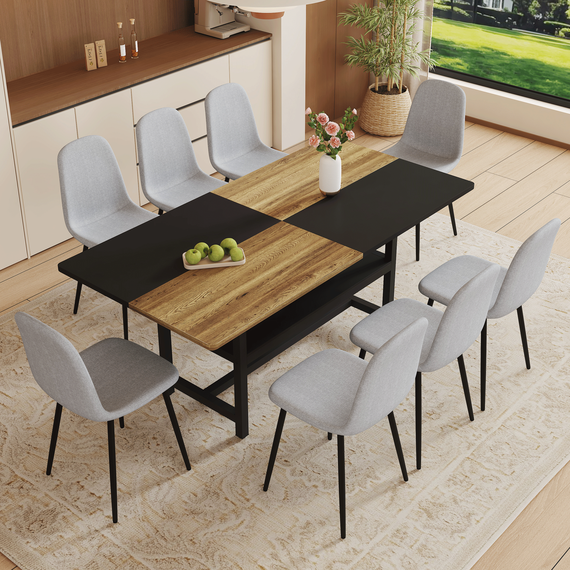 Dining table with wooden top and black frame, surrounded by gray chairs in a modern kitchen.