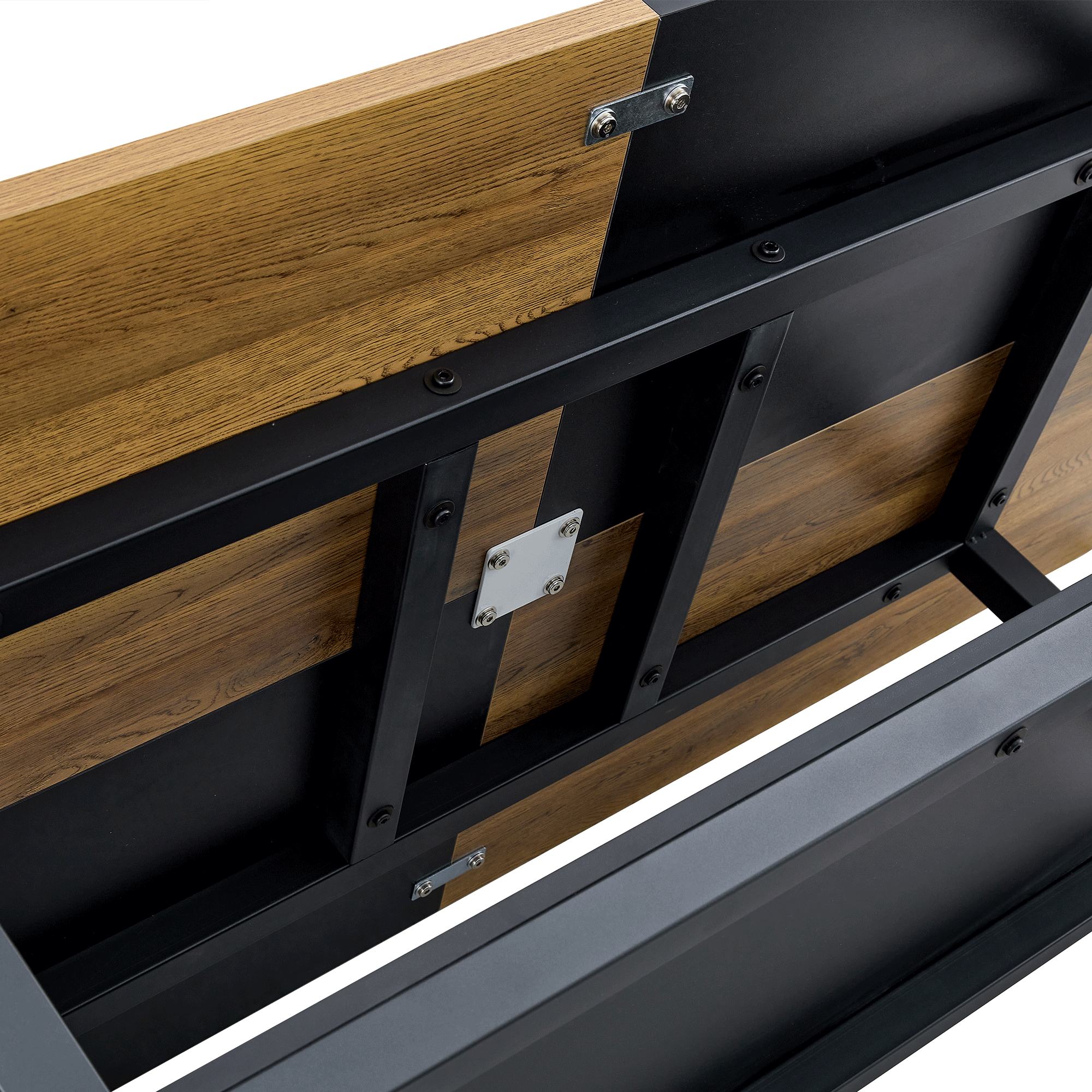 Close-up of underneath the table. A wooden and metal bench with visible screws and joints.