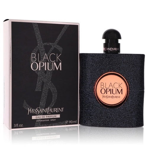 Yves Saint Laurent Black Opium Eau de Parfum bottle and its retail box, featuring a textured black finish with rose gold accents and logo details, set against a clean white background.