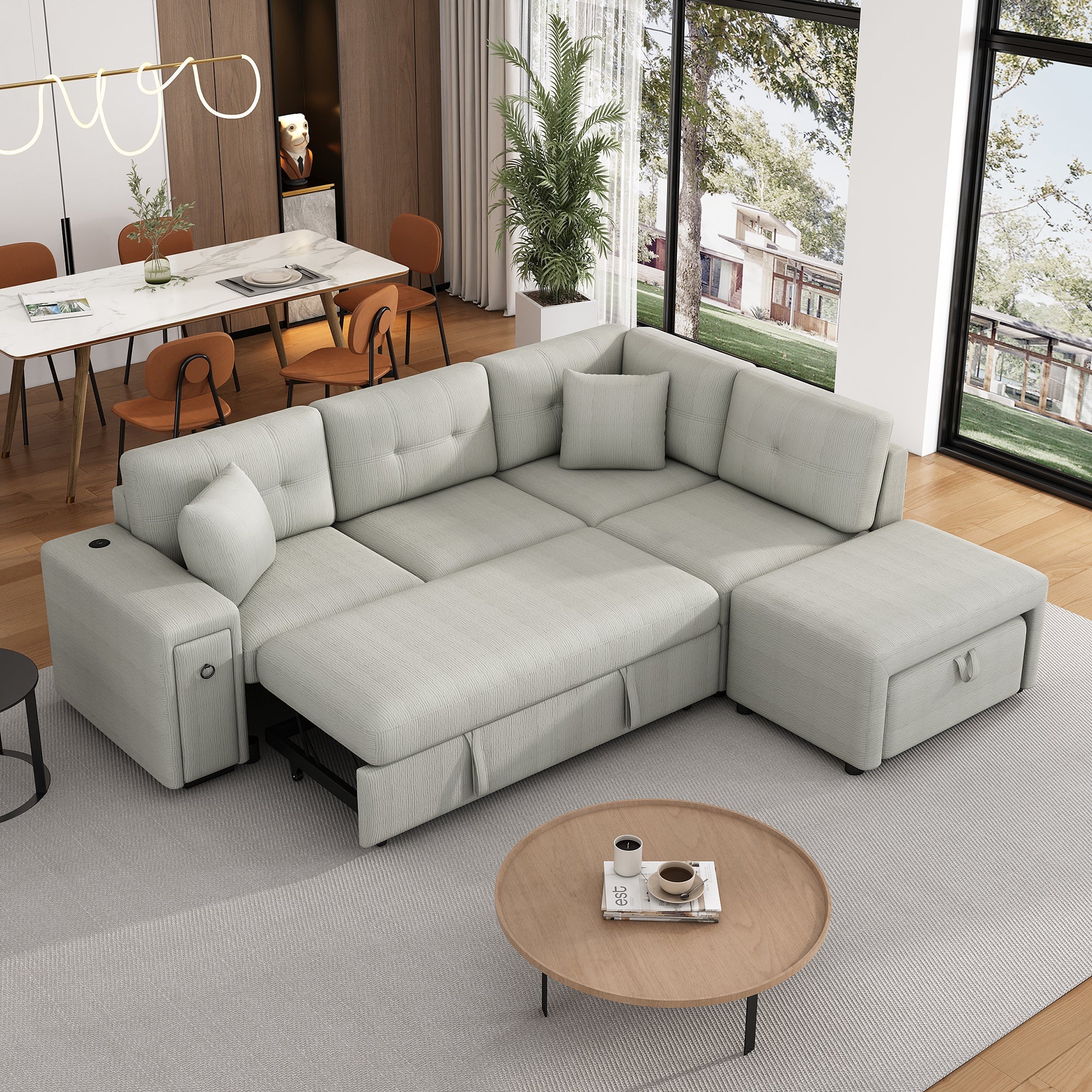 Gray chenille 4-seater convertible sofa bed with movable ottoman and drop-down table with cup holders.