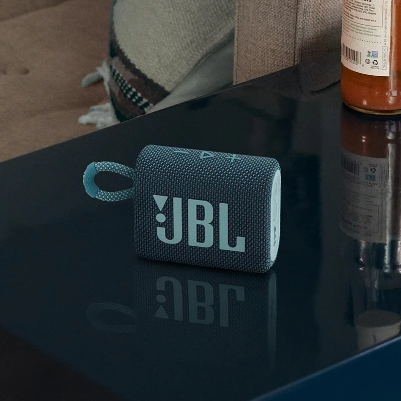 Black JBL Go 3 wireless speaker for travel. Compact, dustproof, and essential personal tech accessory.